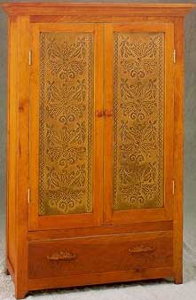 Large cherry armoire featuring Punched Tin Panel RP-1249  "Fleur Jardin".